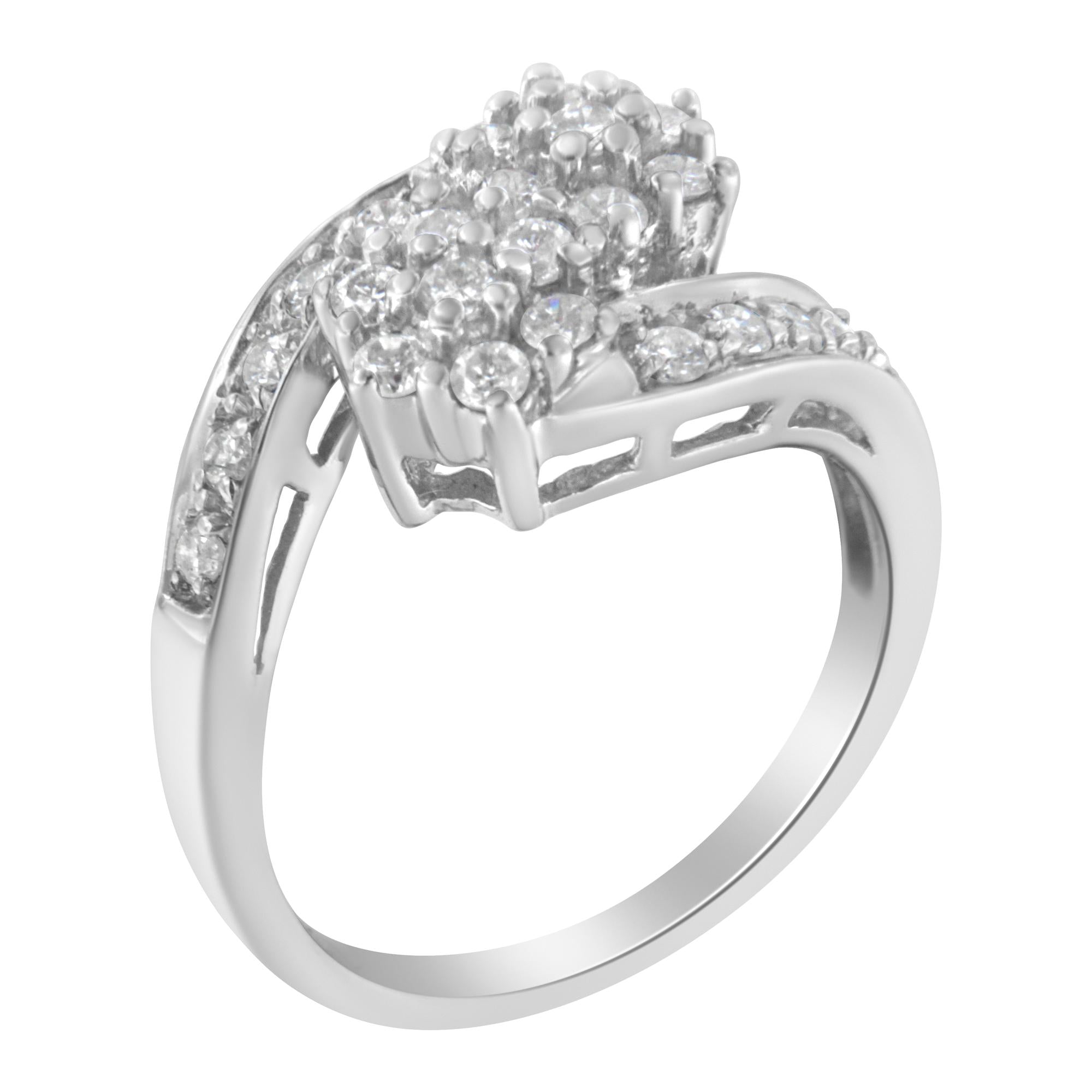 Silver ring with sparkling cluster diamonds in asymmetrical setting.