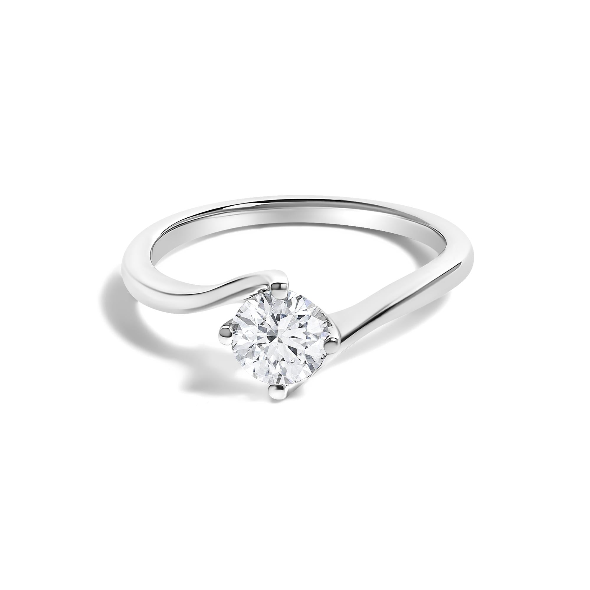 Silver ring with a round diamond set in a twisted band design, on a white background.