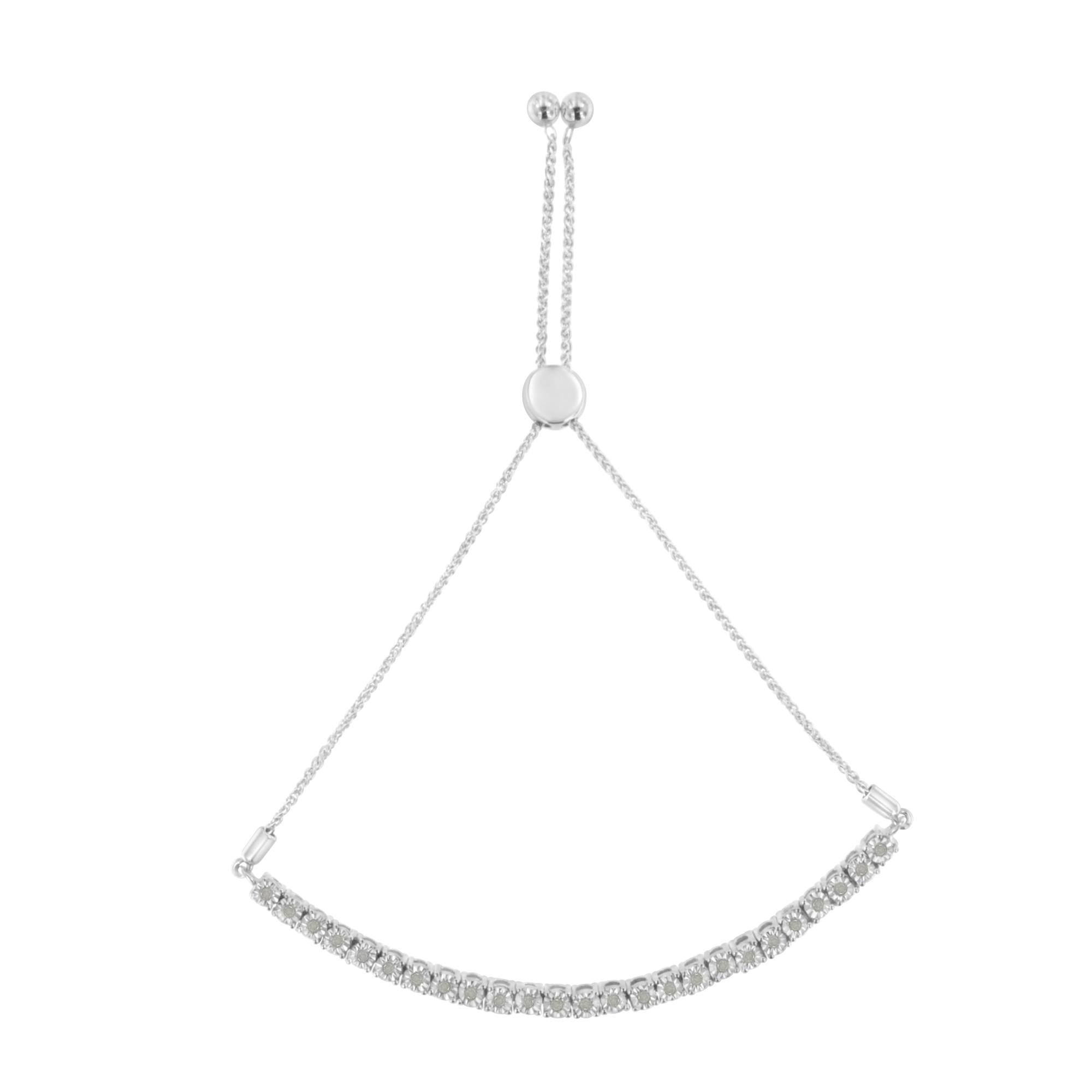 Silver adjustable bracelet with sparkling gems and a sliding closure on a white background.