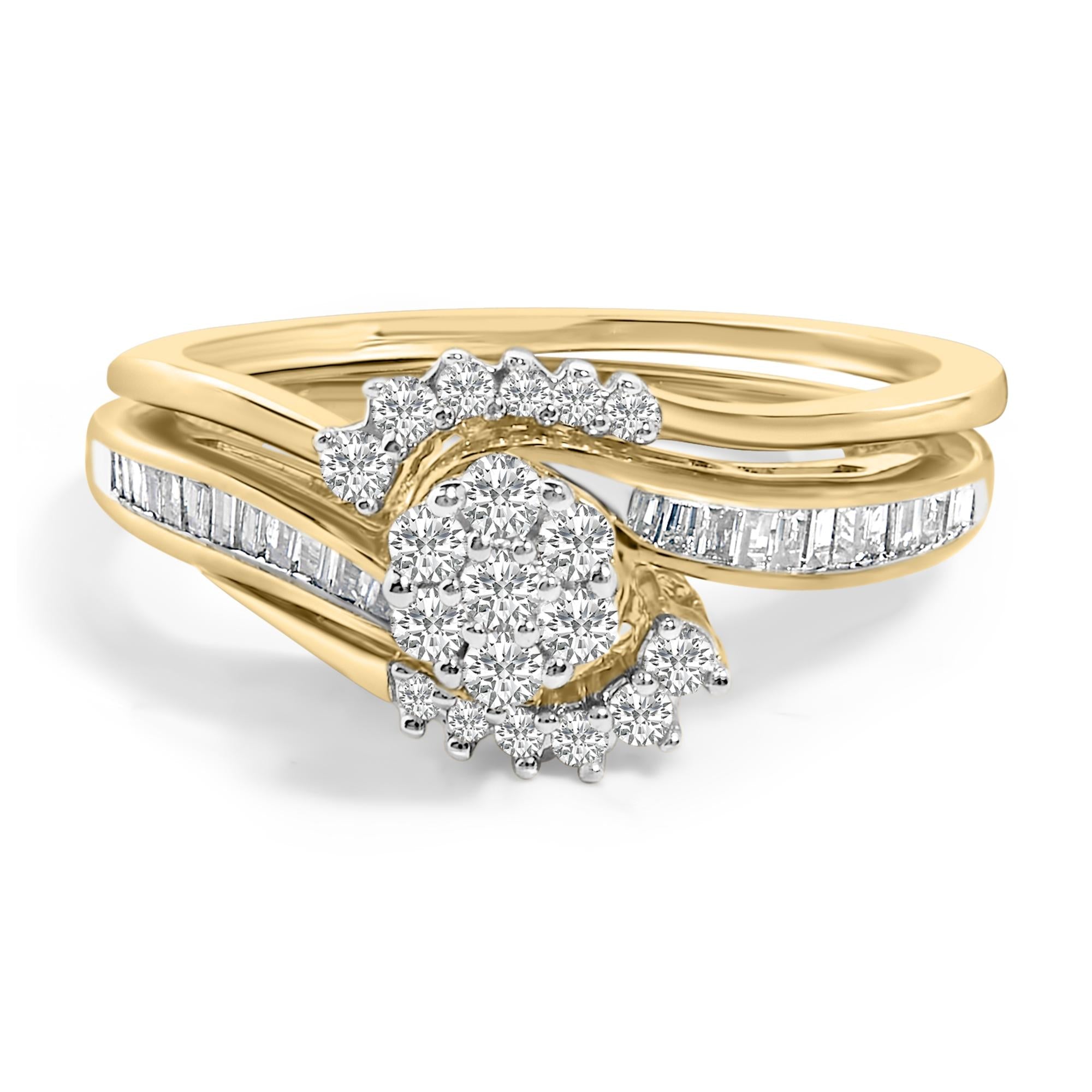 Gold ring with a cluster of round diamonds and baguette accents in a wave design.