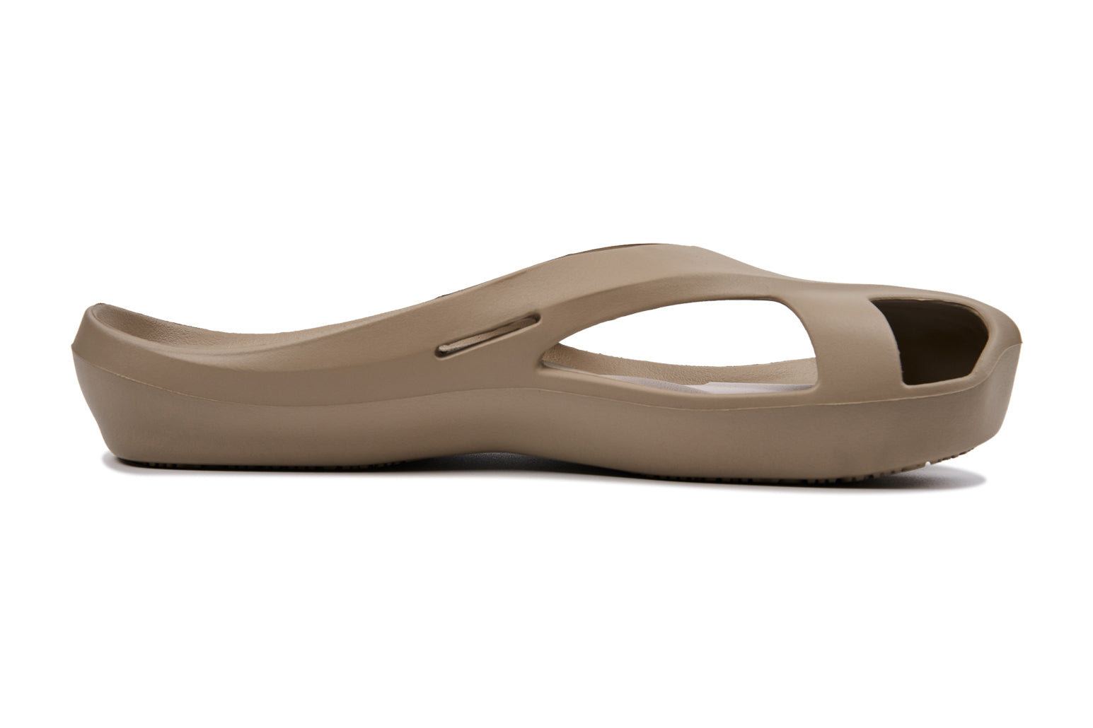 Taupe sandal with open toe, cut-out sides, and a smooth, slightly curved sole.