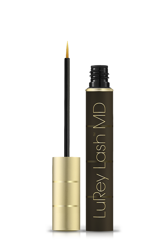Gold and black eyelash serum bottle, open with a thin applicator wand beside it.