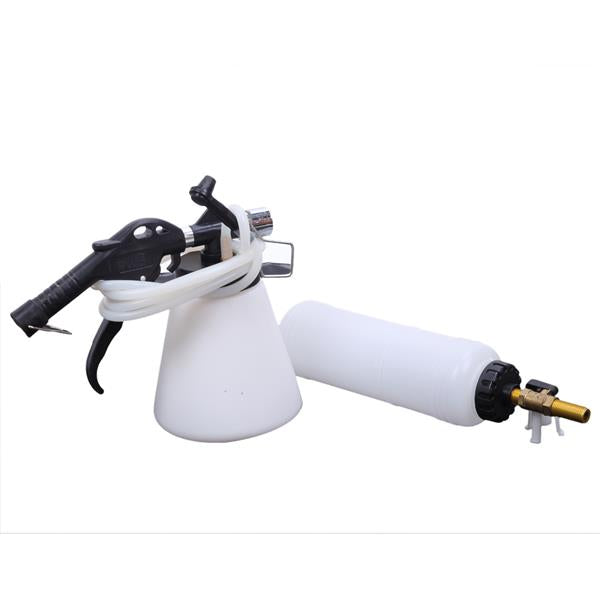 White foam cannon with black handle, attached hose, and brass nozzle, on a plain white background.