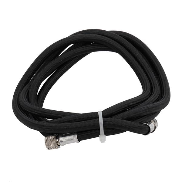 Coiled black cable with metal connectors, secured by a white tie, on a plain background.