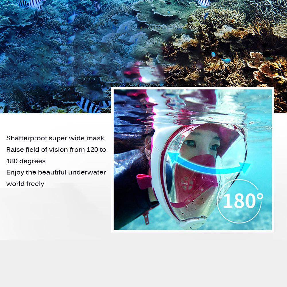 Person snorkeling with a wide pink and white mask, surrounded by vibrant coral and striped fish.