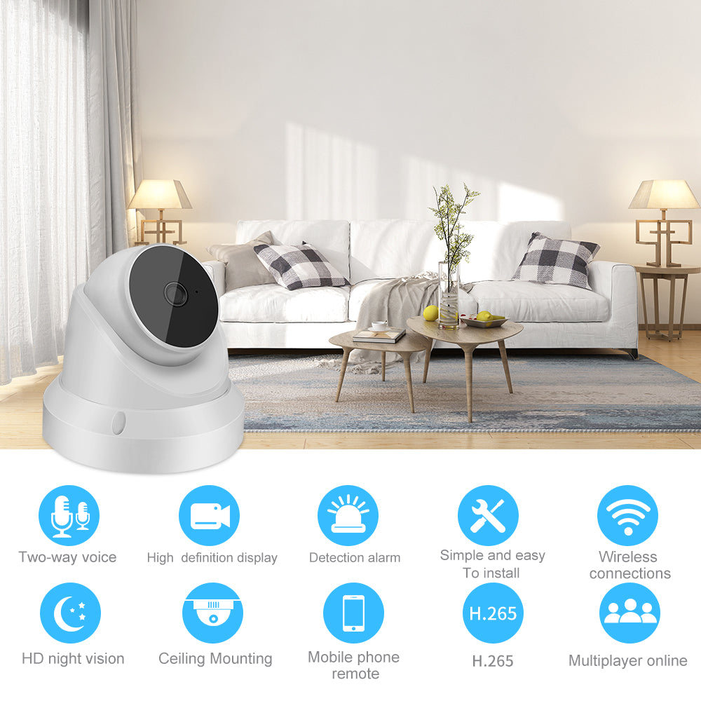 A white home security camera in front of a modern living room with a white sofa and wooden tables.