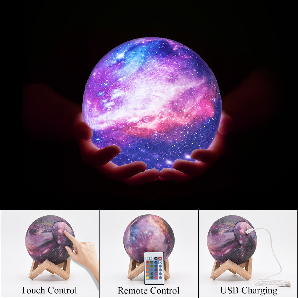 Hands holding a glowing, colorful galaxy lamp; touch and remote controls shown below.