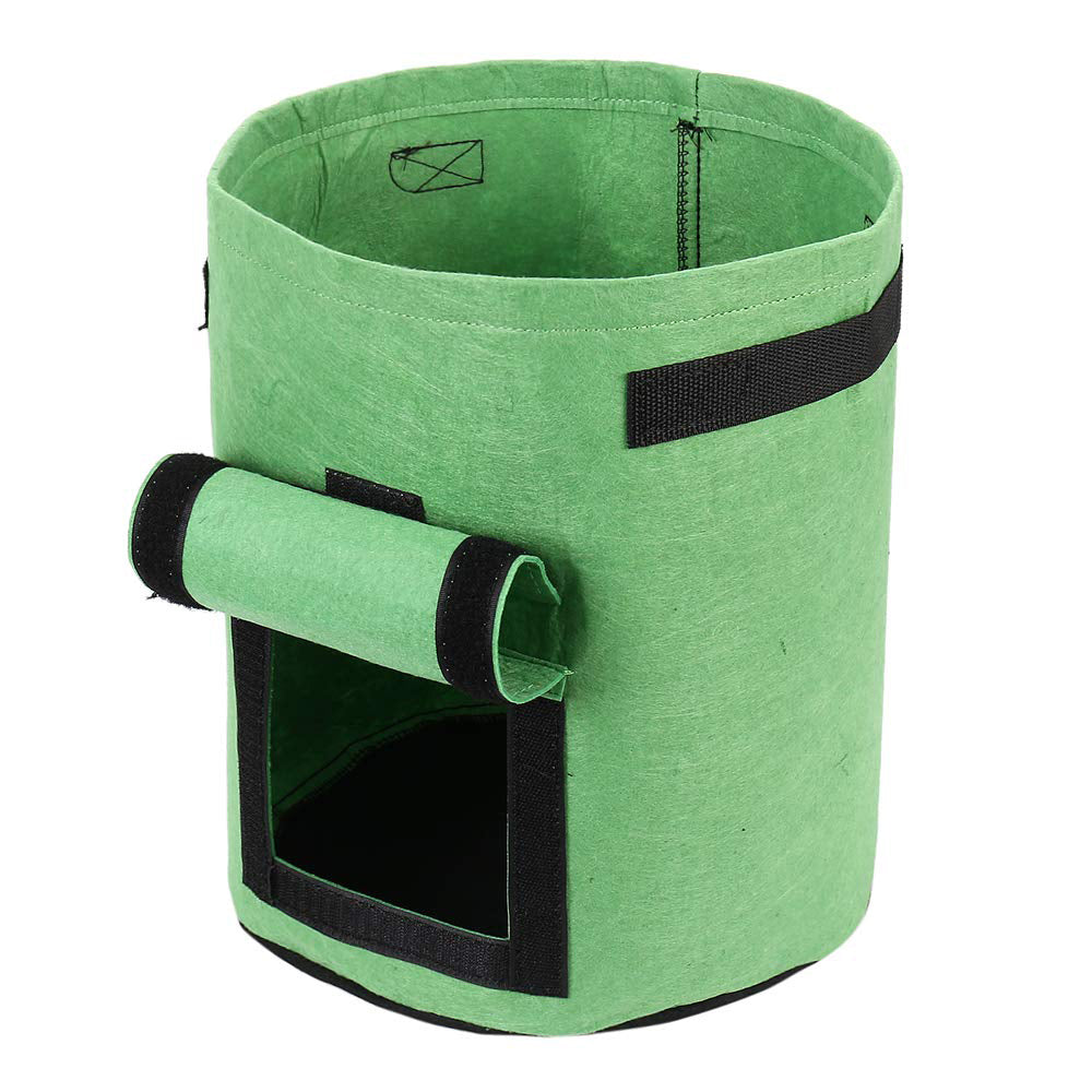 Green cylindrical fabric container with a black handle and flap opening.