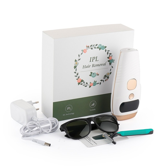 IPL hair removal kit with a device, charger, sunglasses, razor, and decorated box.