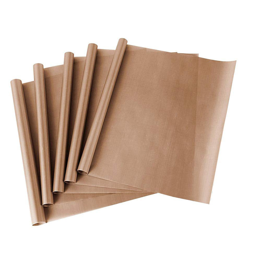 Six rolled brown parchment sheets are fanned out on a white background.