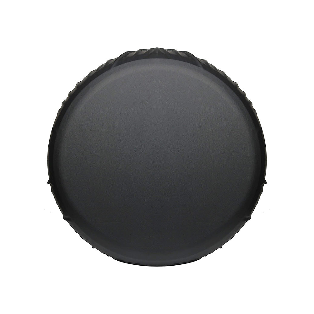Dark gray round object with a smooth surface, slightly textured edges.