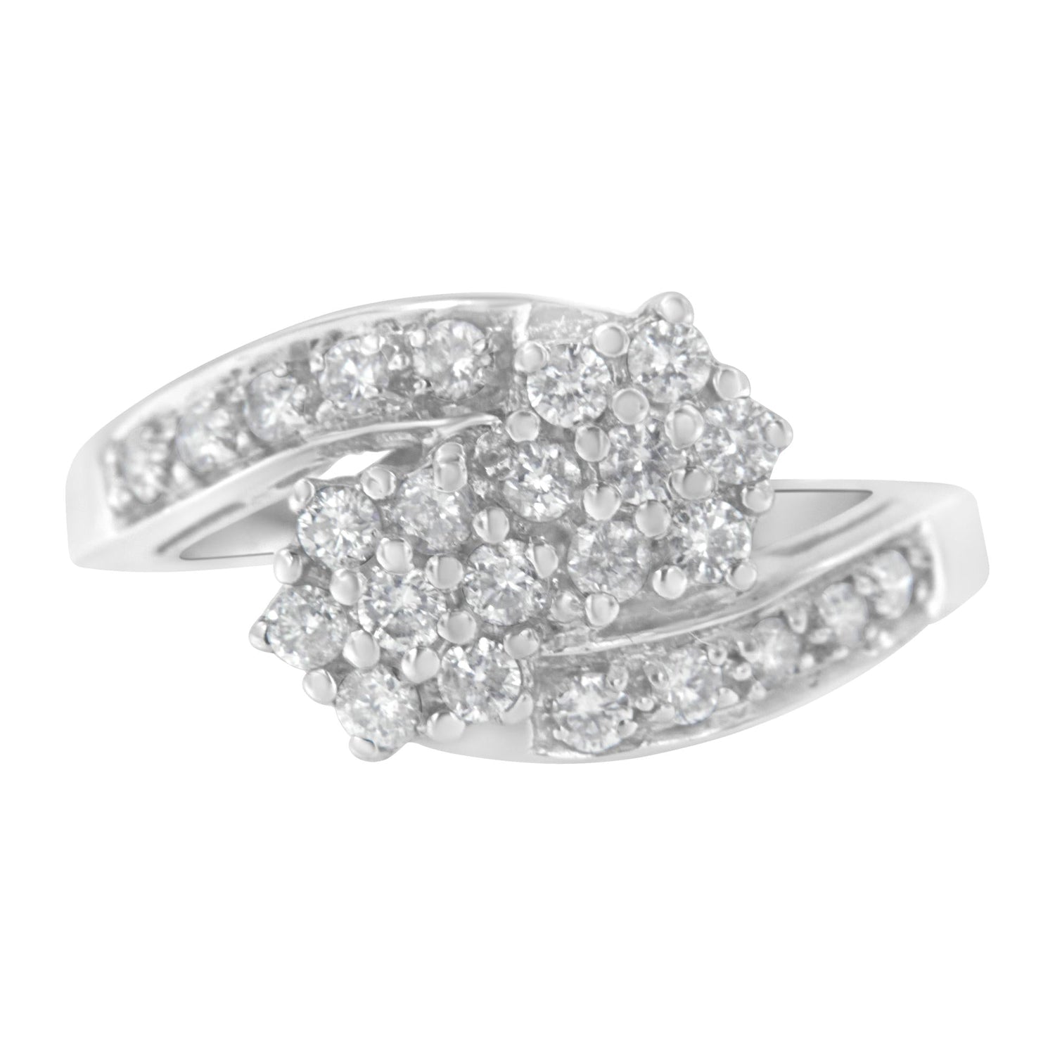Silver ring with diamond clusters and shimmering band accents.