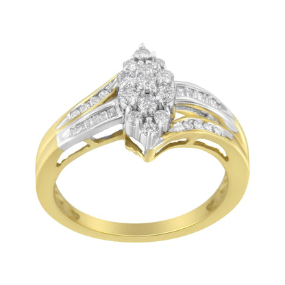 Gold ring with white diamond cluster, split shank design, and varied diamond cuts.