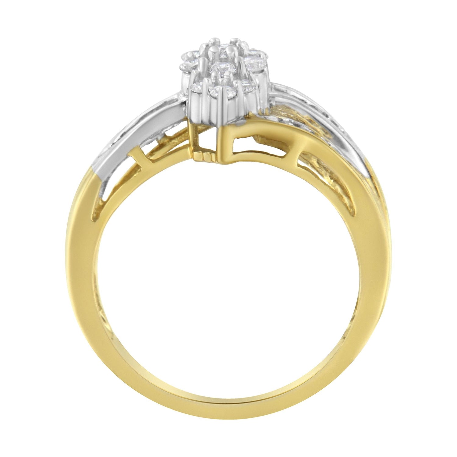 Gold ring with a silver diamond cluster setting, featuring an open intricate band design.