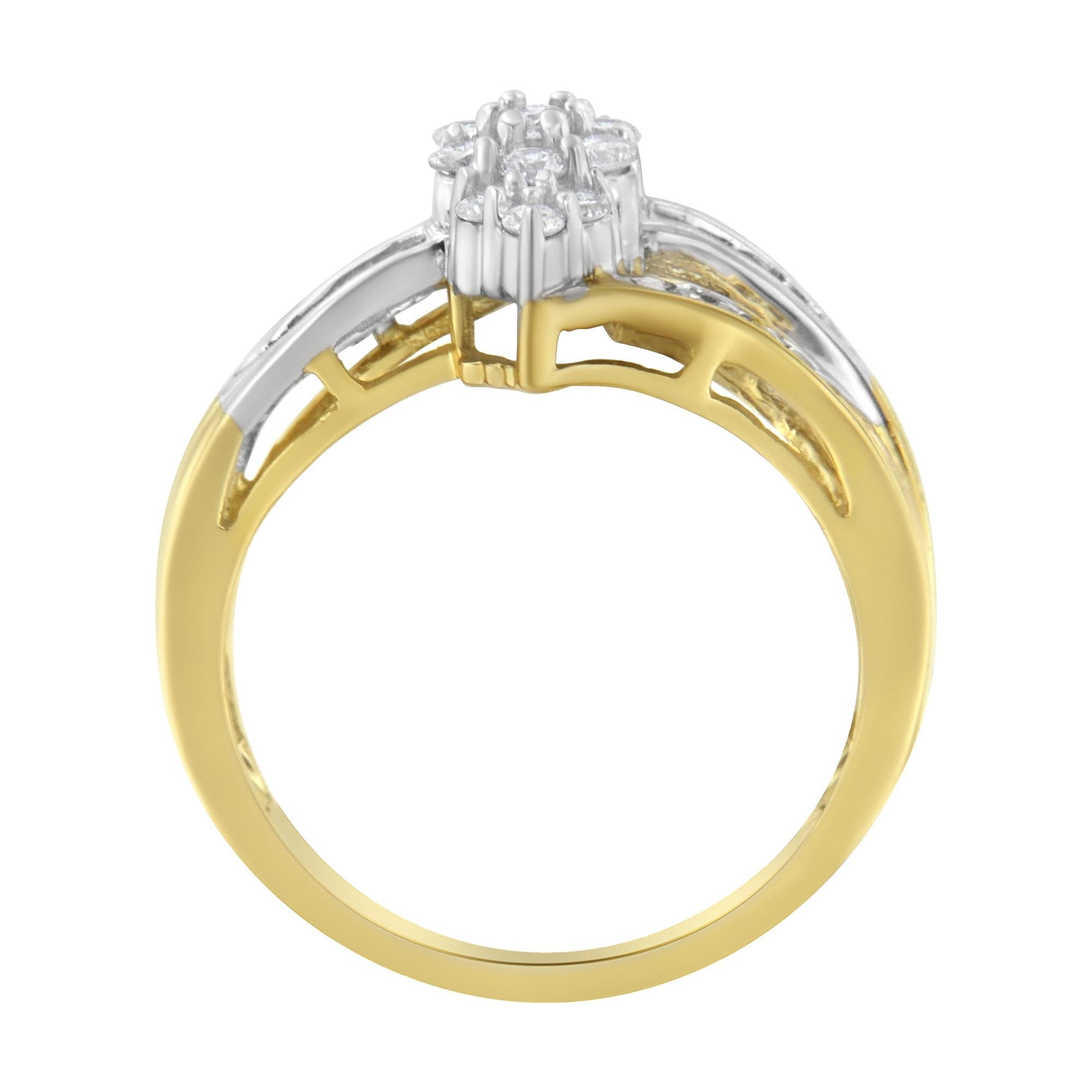 Gold ring with a silver diamond cluster setting, featuring an open intricate band design.