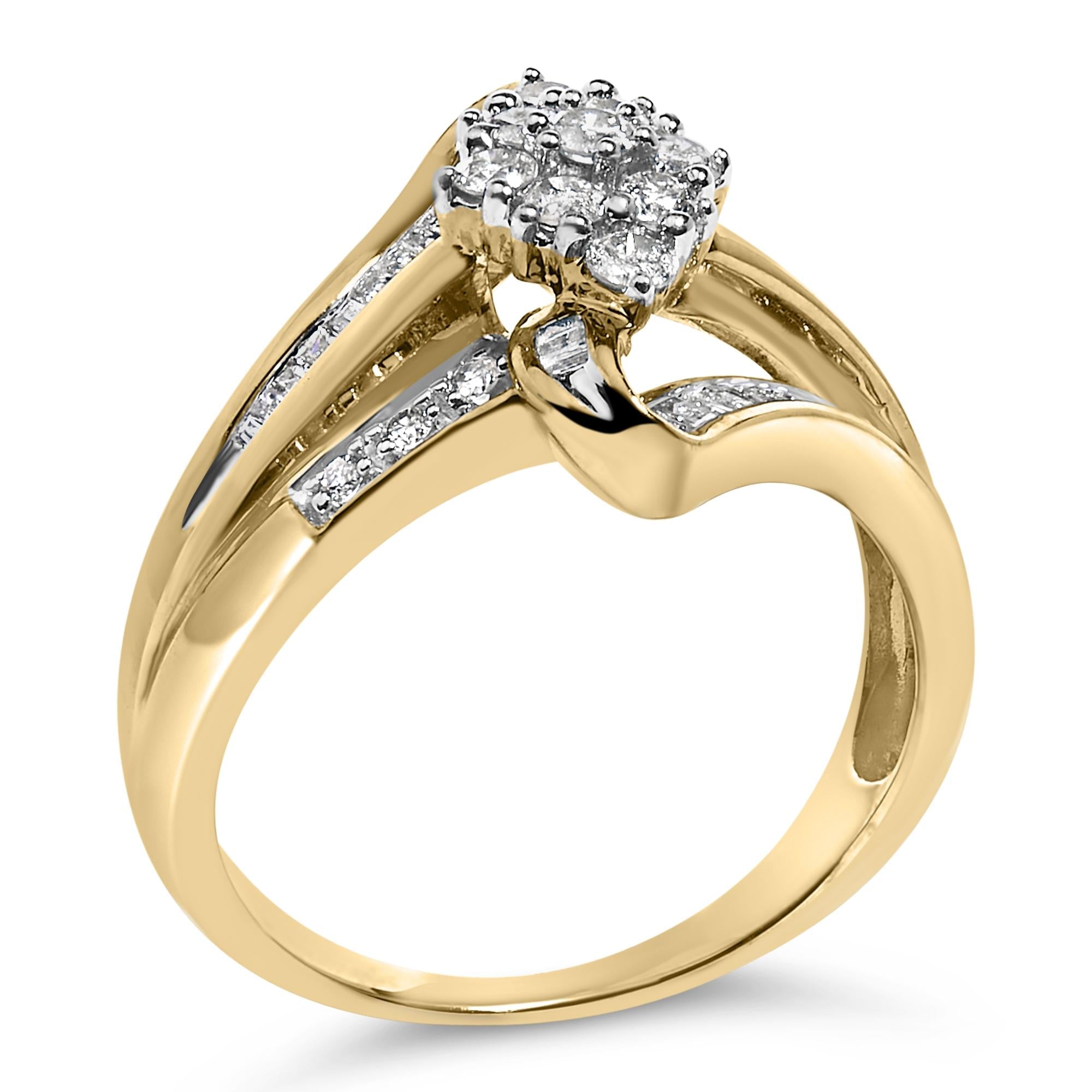 Gold ring with split shank, featuring small round diamonds and a square cluster diamond setting.