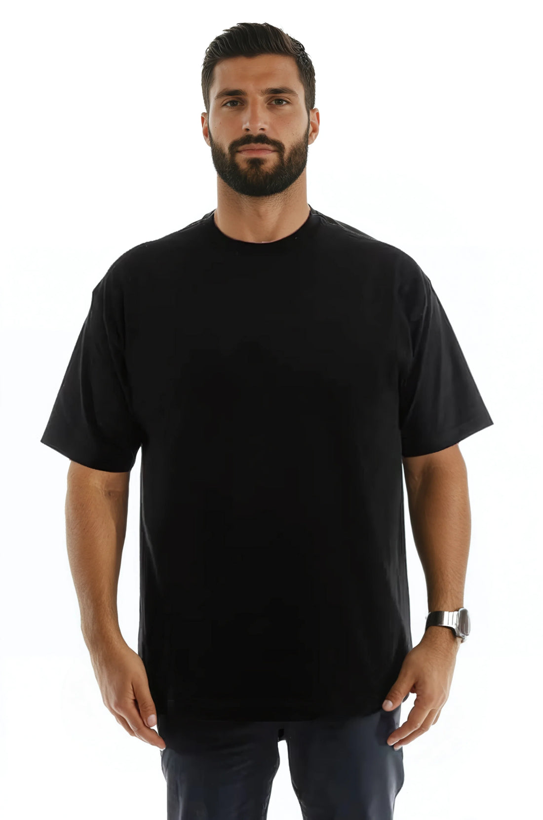 Man wearing a black T-shirt and watch, with a white background.