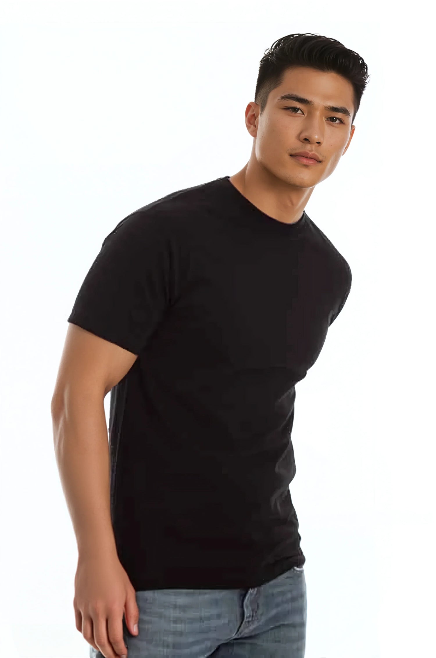 Man in black t-shirt and jeans against a plain white background, slightly leaning forward.