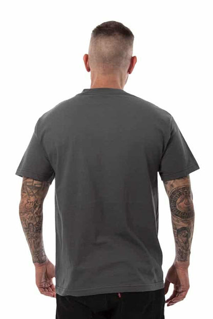 Man in gray T-shirt with tattoos on arms, seen from the back, on a white background.