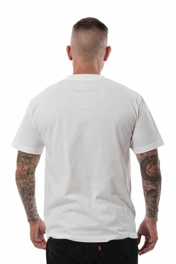Man from behind wearing a white t-shirt and black pants, tattoos on both arms, short hair.