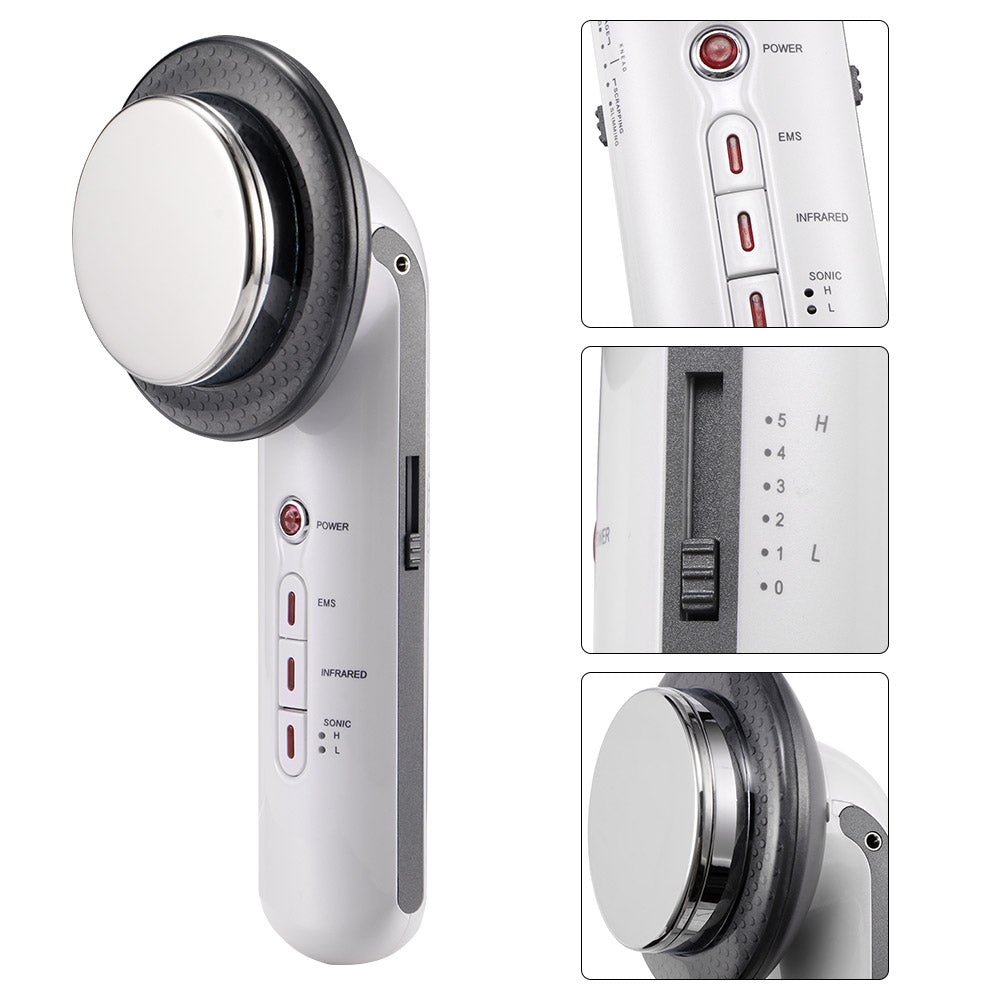 White handheld device with a round silver head, control buttons, and a sliding switch.
