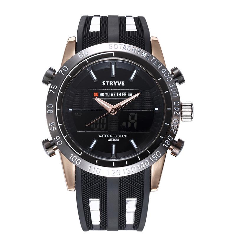Black and silver watch with analog and digital displays, day indicator, and textured black strap.
