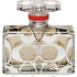 Clear rectangular perfume bottle with white patterns, red band, and silver chain around the neck.