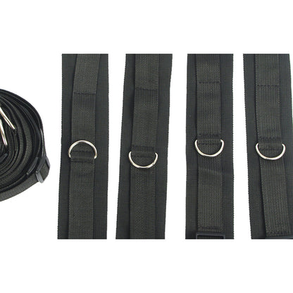 Four black straps with metal D-rings and one rolled strap with metal hooks on the left.