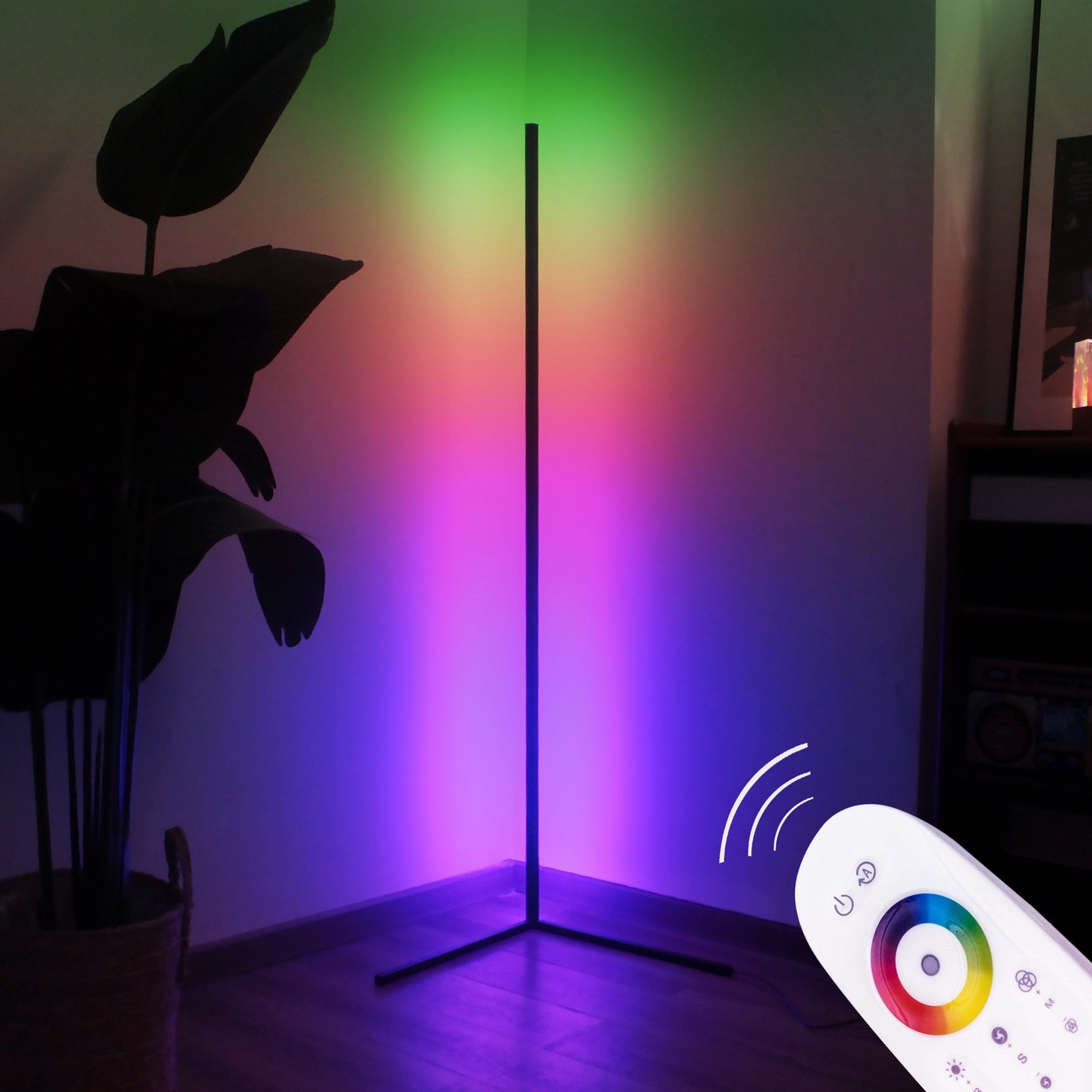 Tall lamp casting green, red, and purple light on wall; remote control in foreground.