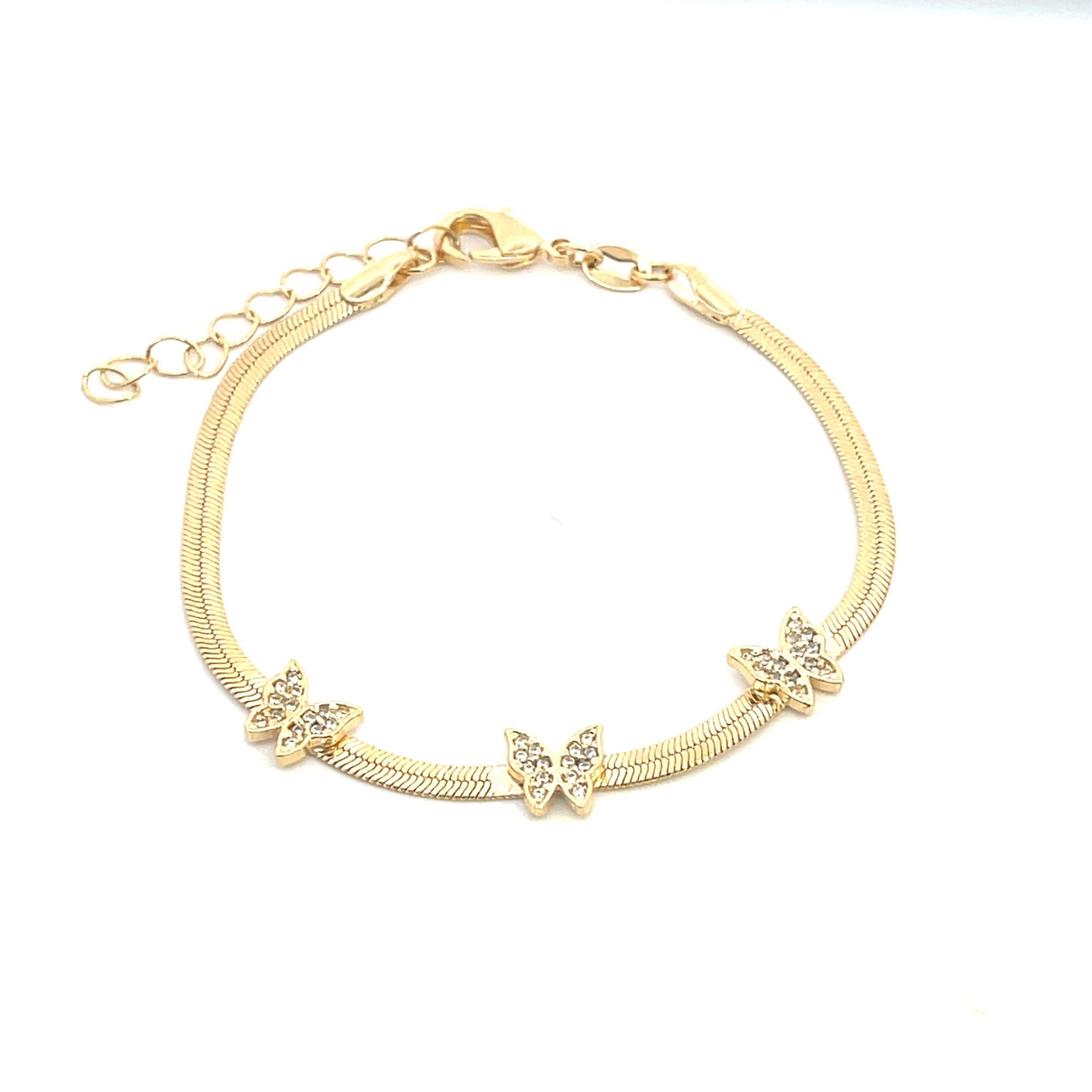 Gold bracelet with three crystal-studded butterfly charms on a smooth chain, featuring an adjustable clasp.