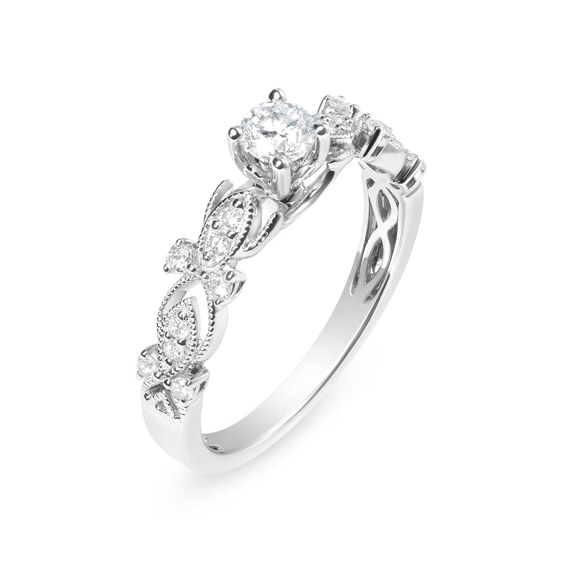 Silver ring with central diamond and intricate vine-like pattern on the band.