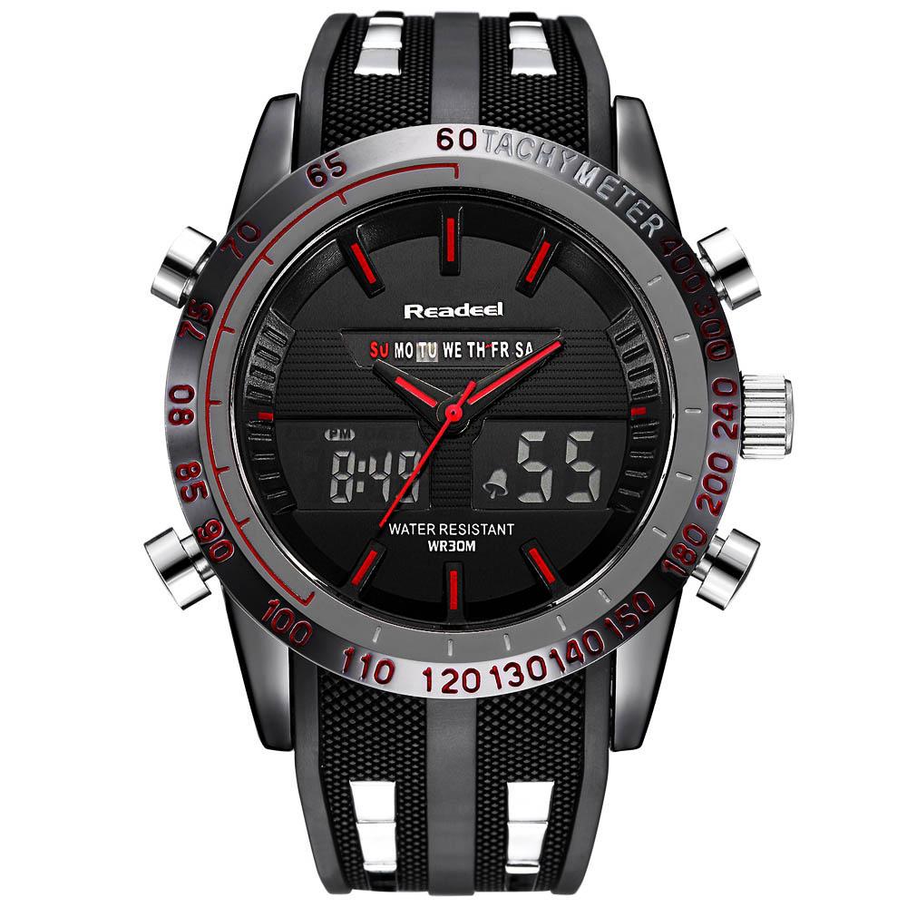 Black and silver digital-analog watch with a red accented face and textured black strap.