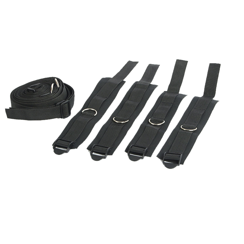 Five black adjustable straps with metal rings, one rolled and four laid flat.