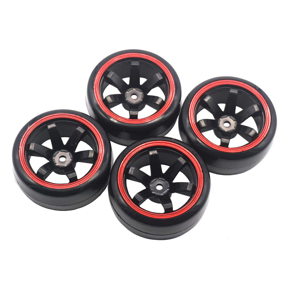 Four black wheels with red rim accents, featuring five-spoke designs, arranged in a group.