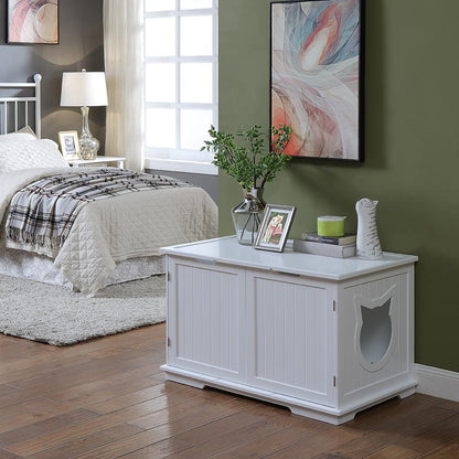 Bedroom with olive walls, white furniture, abstract art, and a white storage bench with a cat cutout.