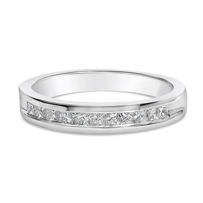 Silver ring with embedded square-cut diamonds in a channel setting on a white background.