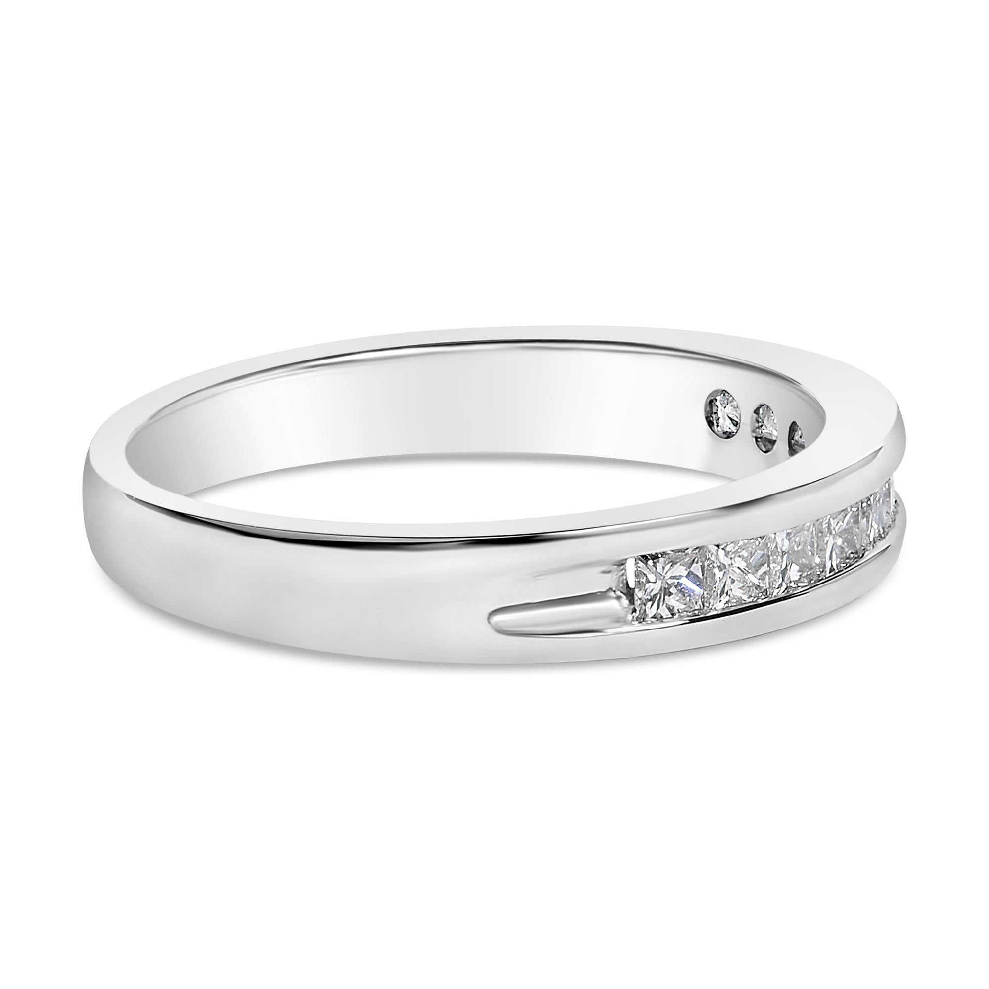 Silver band ring with channel-set square diamonds, polished finish.