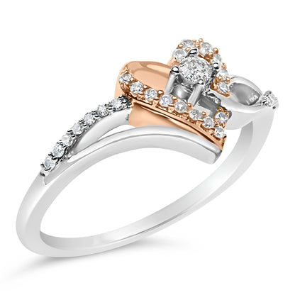 Silver and rose gold ring with sparkling diamonds in heart and swirl design.