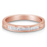 Rose gold ring with a row of rectangular clear gemstones set into the band.