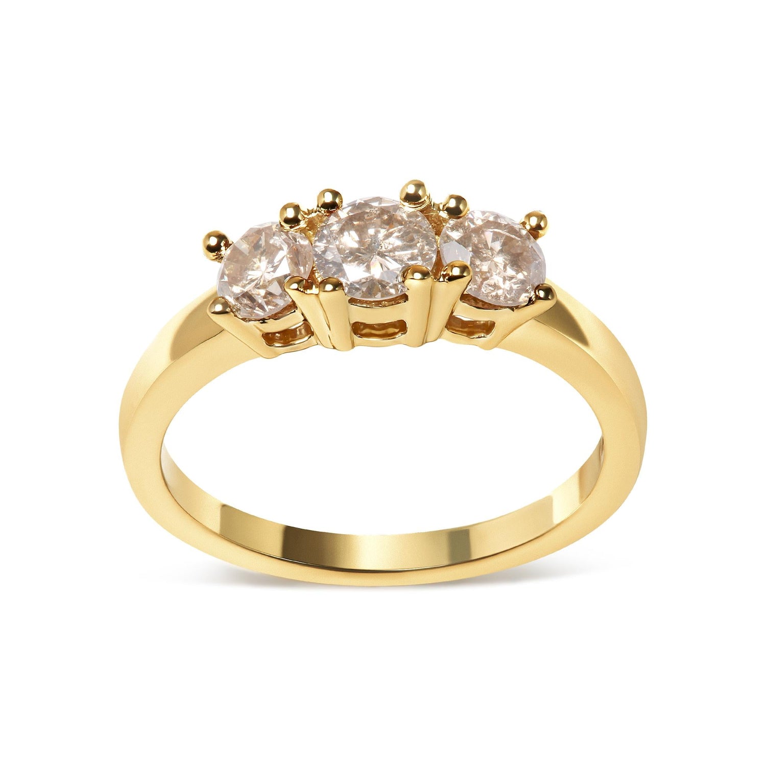 Gold ring with three round diamonds set in prongs, elegant and reflective design.