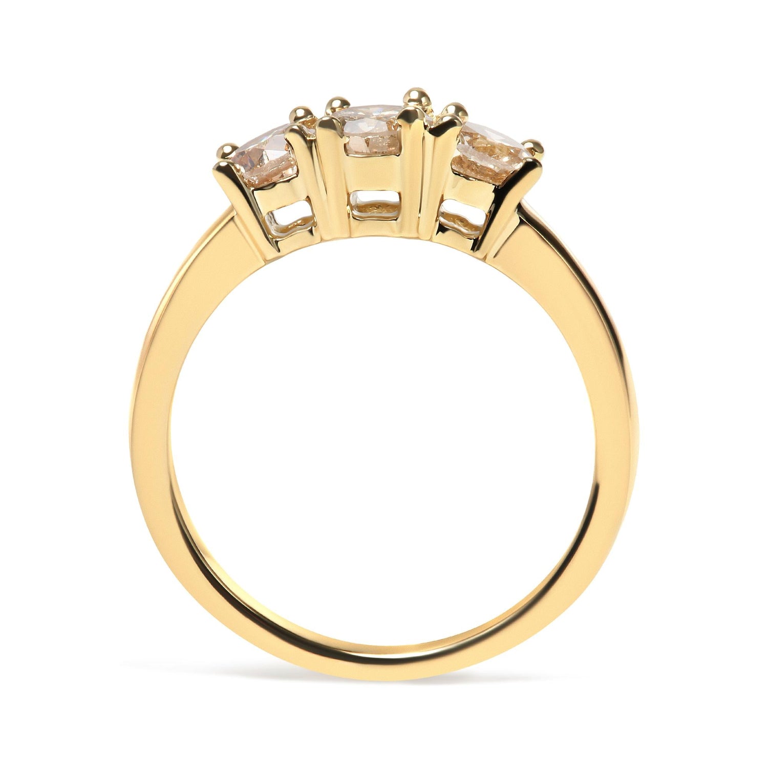 Gold ring with four diamond prongs side view; smooth band, intricate setting.