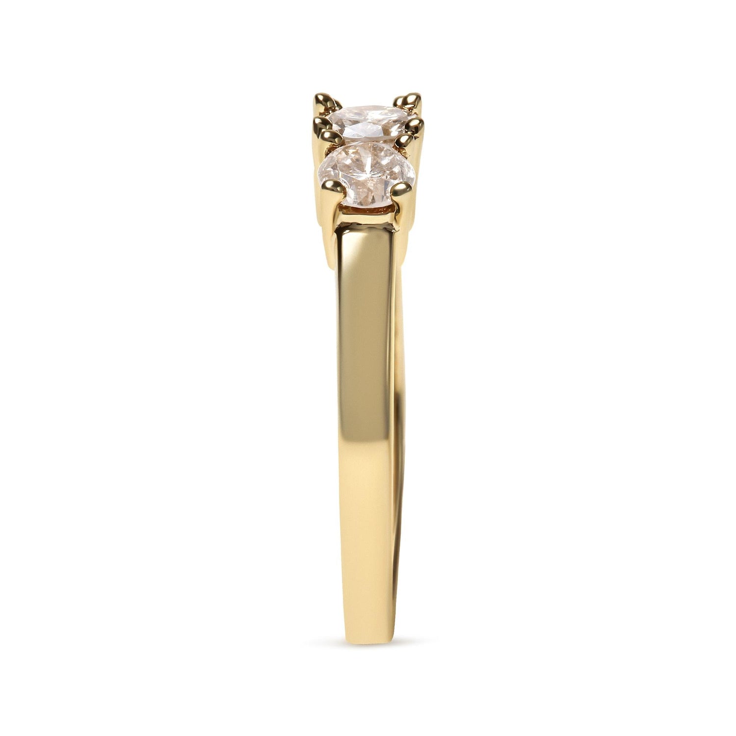 Gold ring with two side-by-side round diamonds, set in a prong setting, viewed from side.