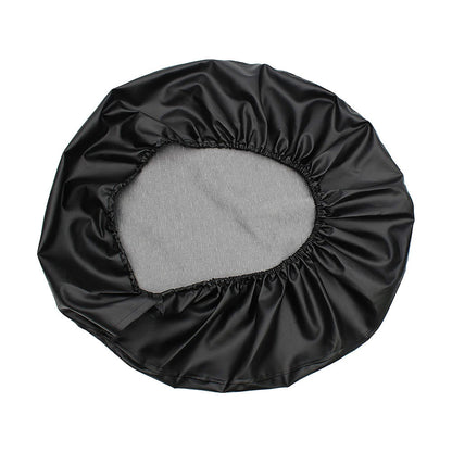 Black round satin bonnet with a gray inner lining and elastic edge.