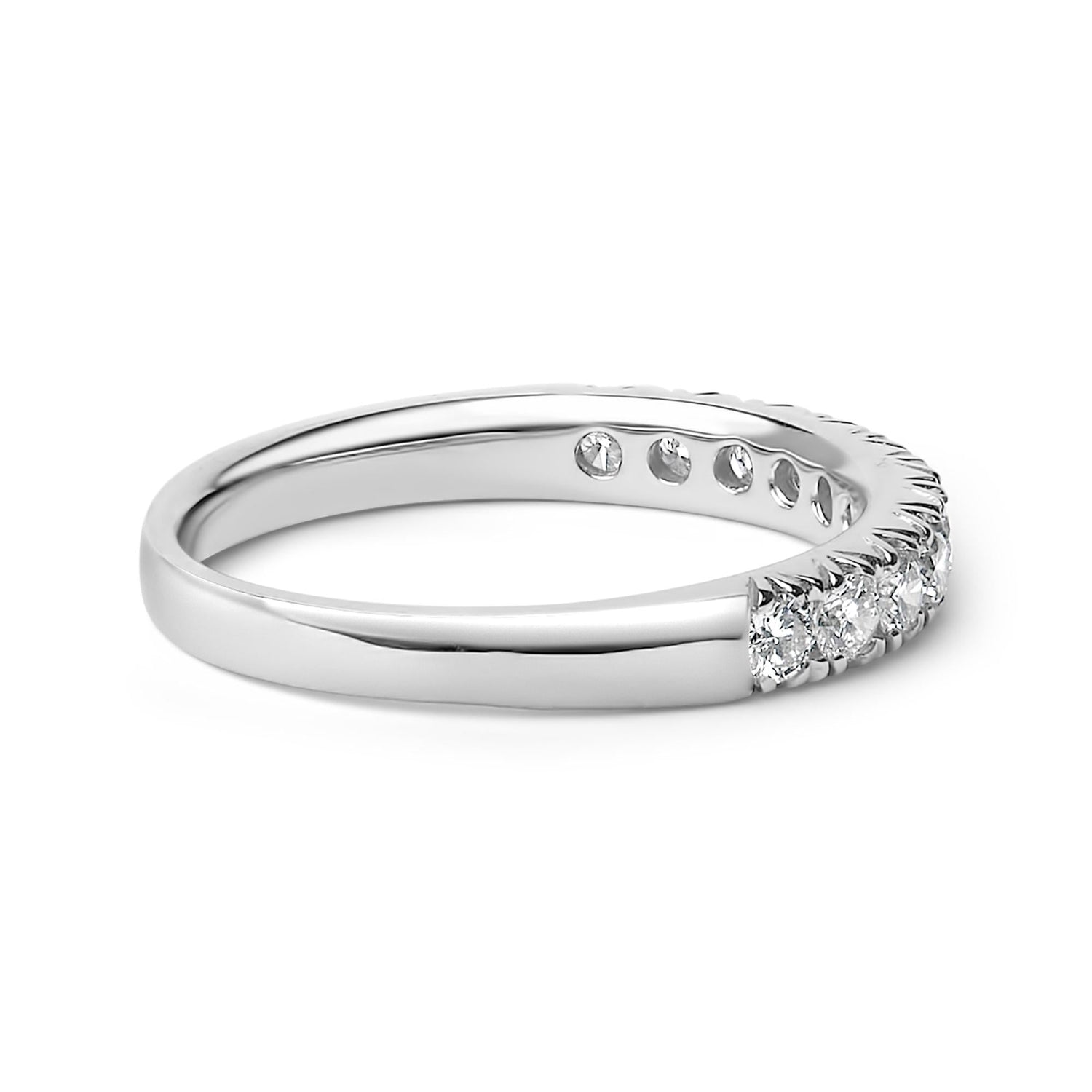 Silver ring with small, sparkling diamonds set on the top half against a white background.