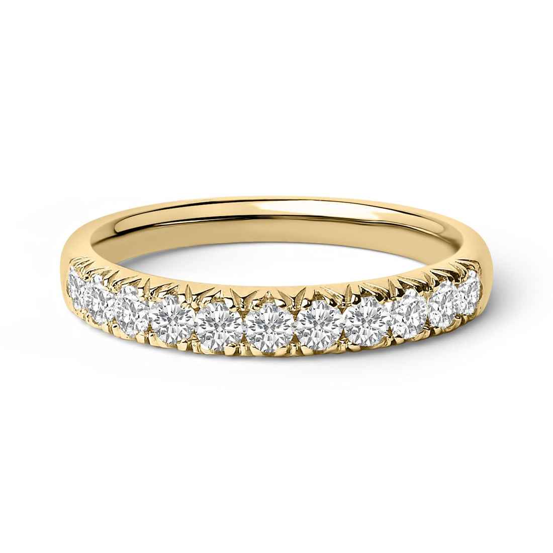 Gold ring with a row of sparkling round diamonds set halfway around the band.