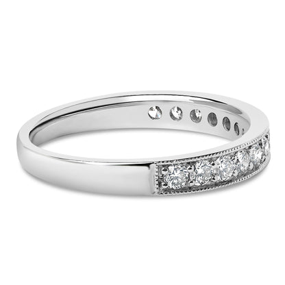 Silver ring with small round diamonds embedded halfway around, polished finish.