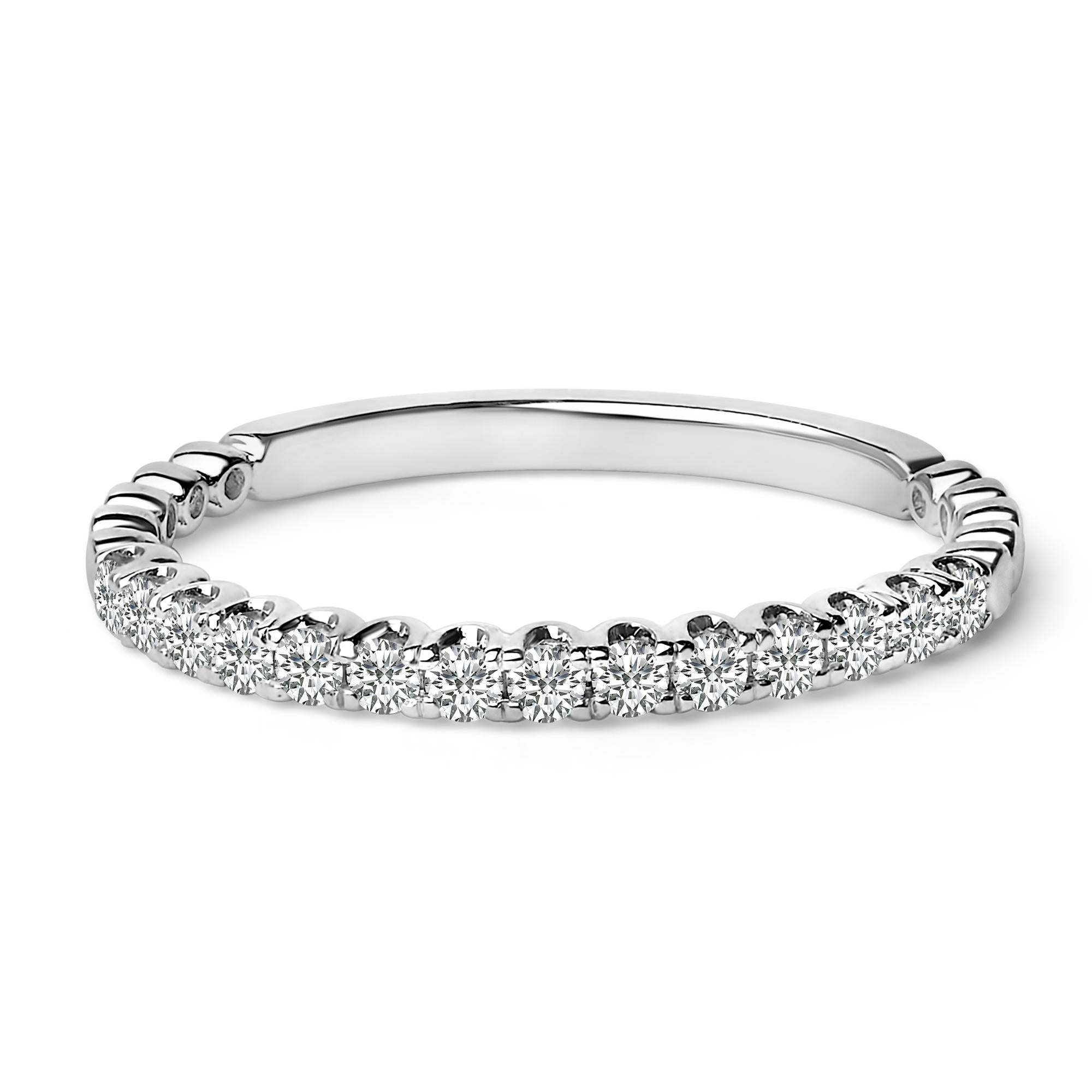Silver band ring adorned with a row of sparkling round diamonds in a minimalist setting.
