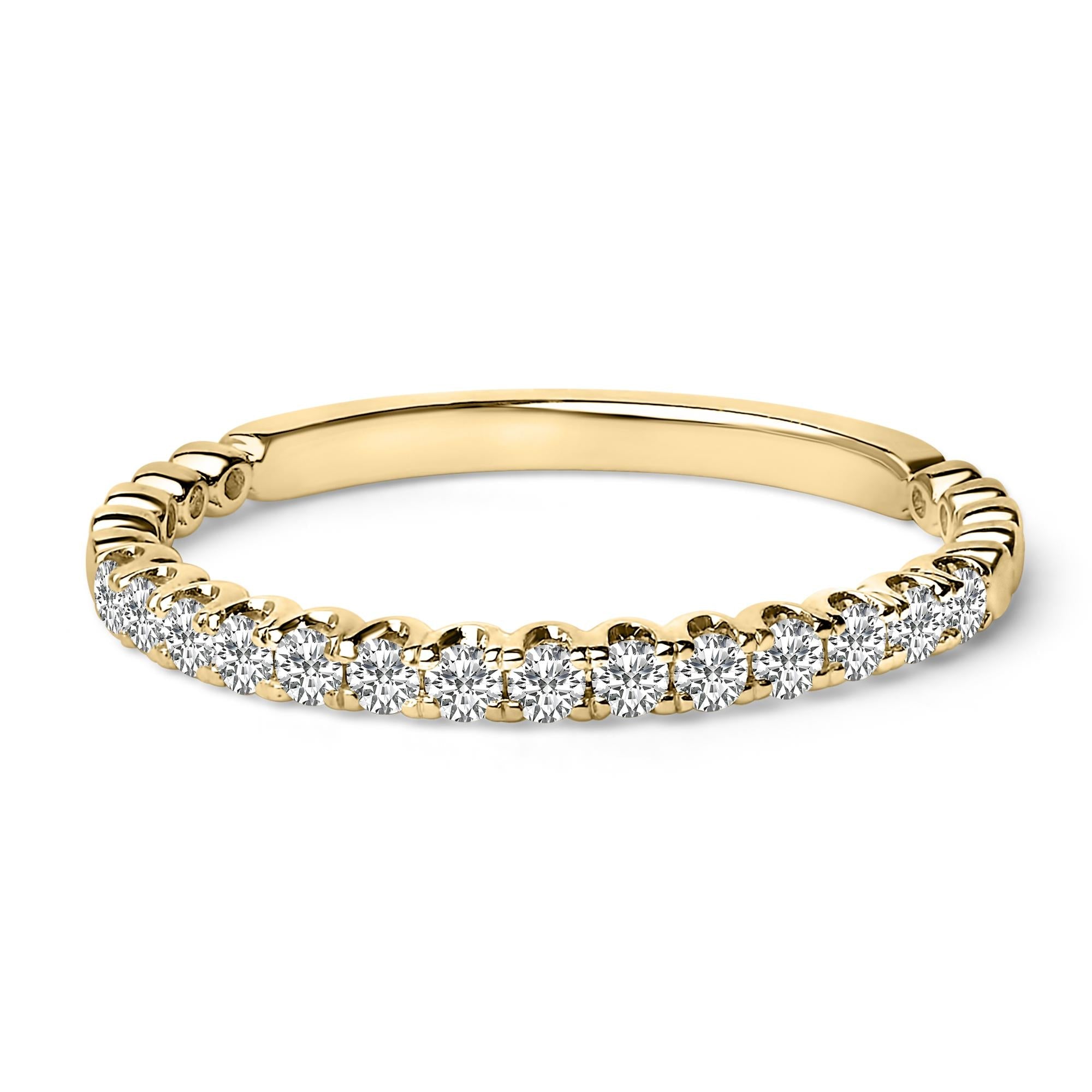 Gold ring with sparkling round diamonds set halfway around the band.