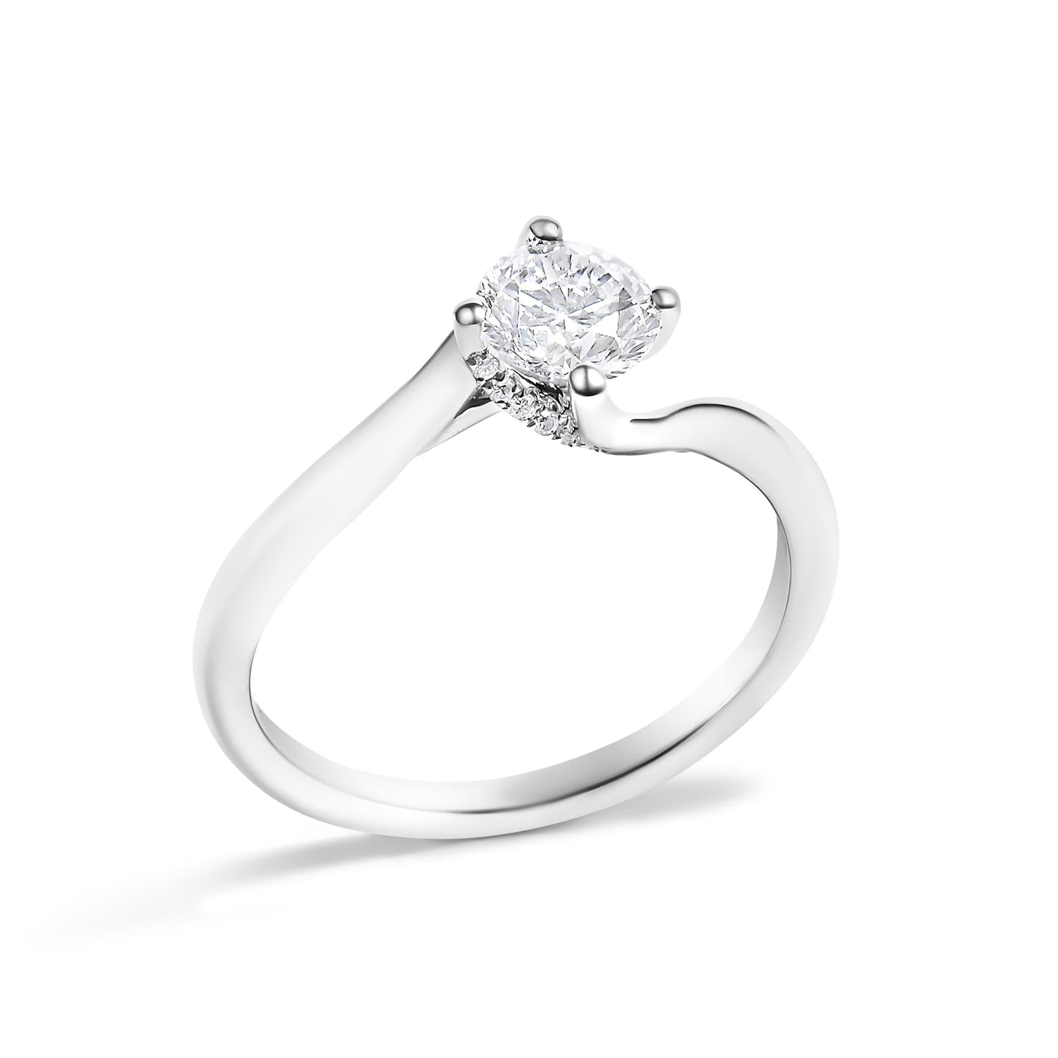 Silver ring with a round diamond centerpiece and small side stones, featuring a twisted band design.