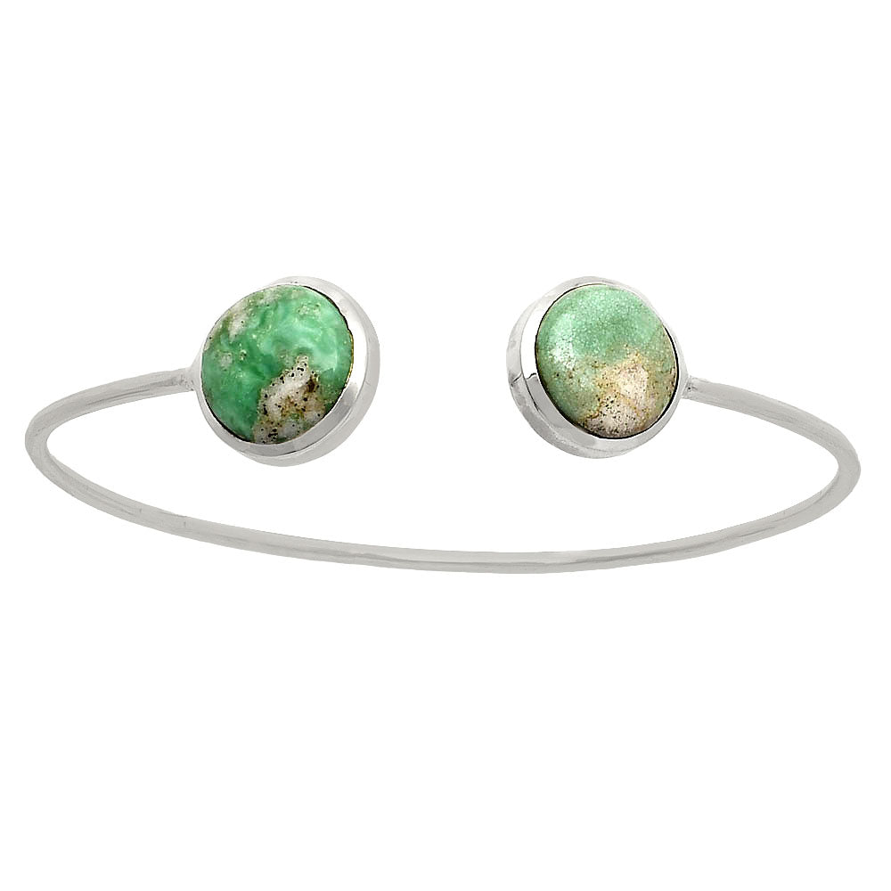 Silver bracelet with two round, mottled green stones on each open end.